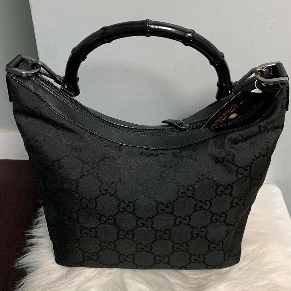 Authentic Gucci black leather and nylon jumbo GG hobo bag w bamboo handle